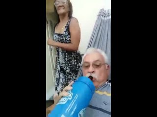 old man having fun with his wife